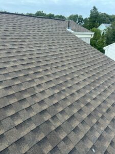 Contractor giving spring roof tips on a home in North Jersey